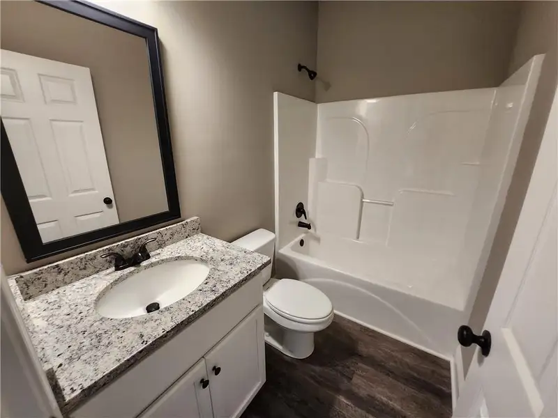 Furnished interior view inside a new home in , Carrollton (Image 3).