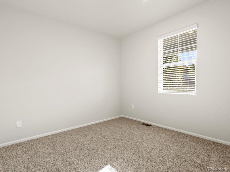 Spacious, unfurnished interior of a new home in Poudre Heights: The Lakes Collection, Windsor (Image 26).