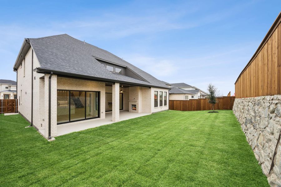 Exterior details and patio area of a home in The Grove Frisco, Frisco (Image 4).