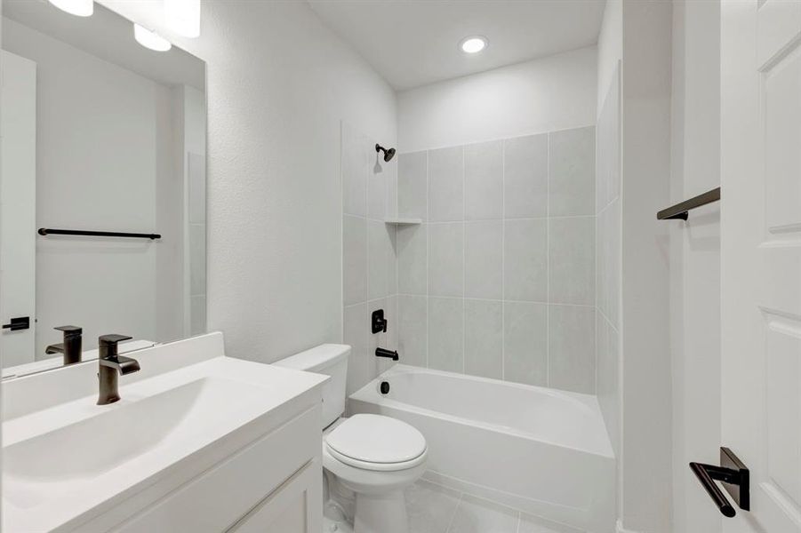 Furnished interior view inside a new home in Hillside at Las Colinas, Irving (Image 7). Furnished interior view inside a new home in Hillside at Las Colinas, Irving (Image 7).