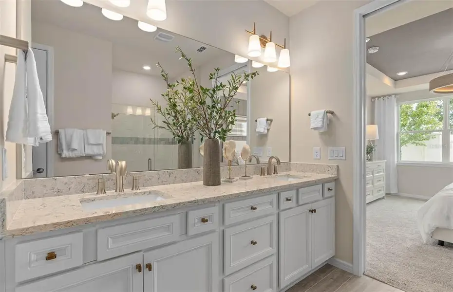 Furnished interior view inside a new home in Del Webb Sunbridge, St. Cloud (Image 19).