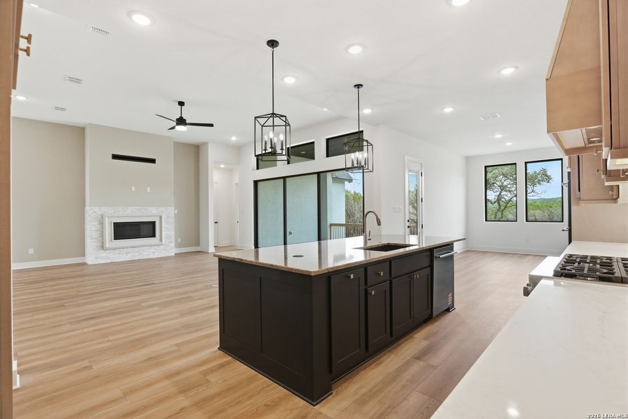 Furnished interior view inside a new home in Enchanted Bluff, San Antonio (Image 13).
