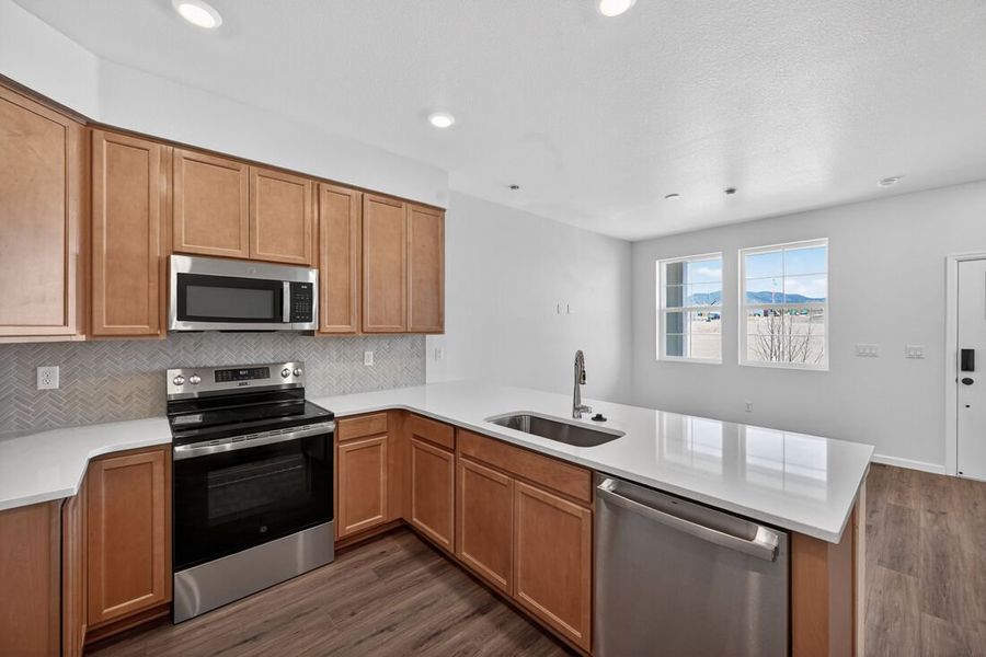 Furnished interior view inside a new home in Trailstone, Arvada (Image 3).