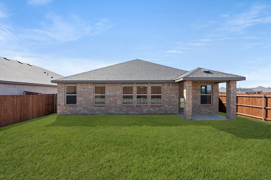 Front exterior of a new home in Northspur, Terrell, TX, highlighting curb appeal (Image 26). Front exterior of a new home in Northspur, Terrell, TX, highlighting curb appeal (Image 26).