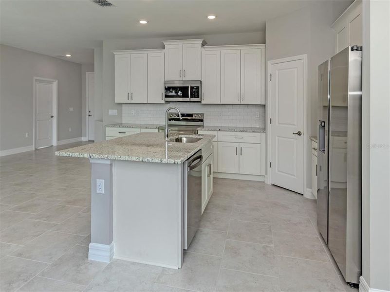 Furnished interior view inside a new home in , North Port (Image 9).