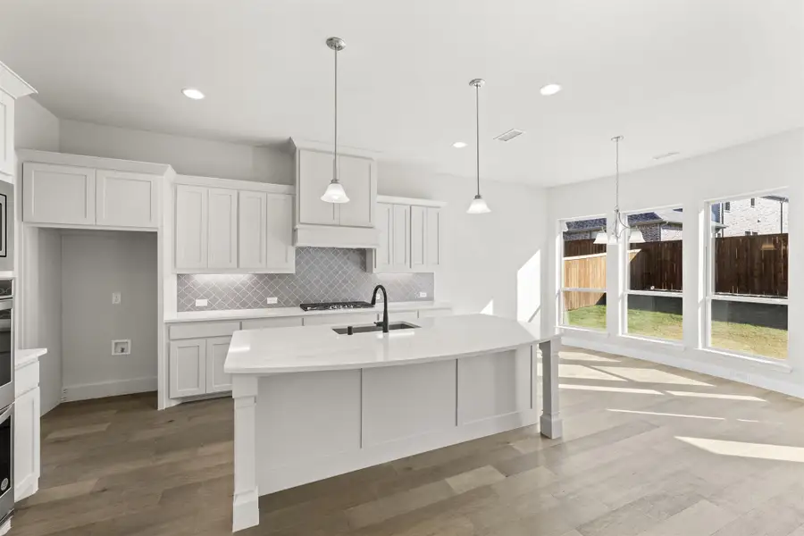 Representative furnished interior of a home built from the Portsmouth by Windsor Homes in Nelson Lake Estates, Rockwall (Image 9).