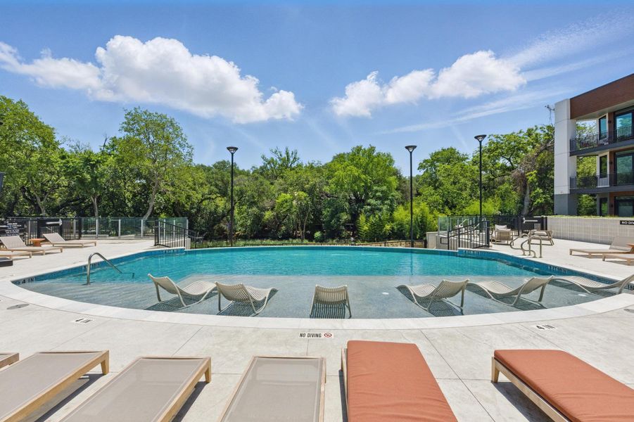 An inviting pool oasis awaits, perfect for leisure and sun-drenched relaxation.