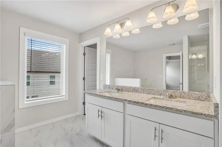 Furnished interior view inside a new home in The Fairways at Mirror Lake, Villa Rica (Image 7).