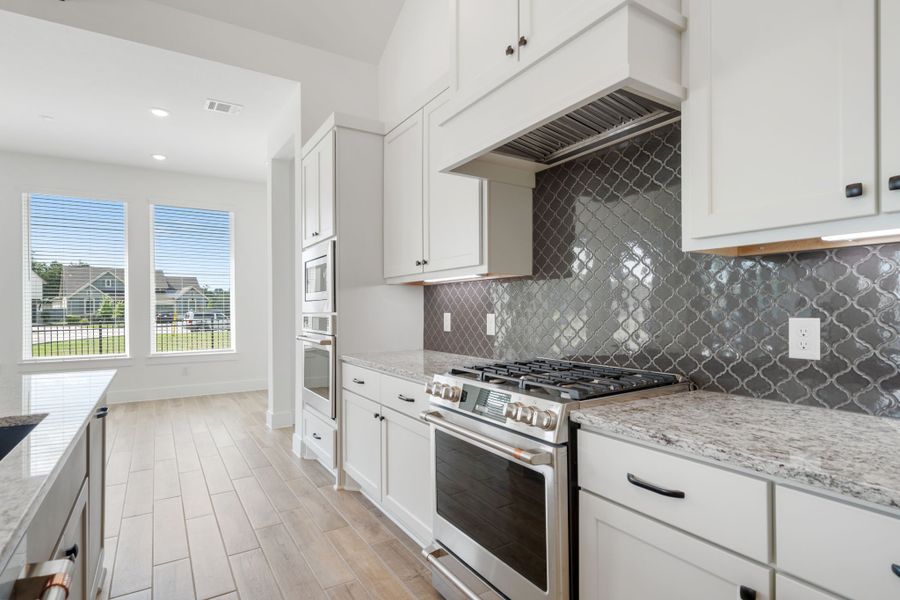 Representative furnished interior of a home built from the Malibu – 60′ Lot by Chesmar Homes in Fulshear Lakes, Fulshear (Image 8). Representative furnished interior of a home built from the Malibu – 60′ Lot by Chesmar Homes in Fulshear Lakes, Fulshear (Image 8).