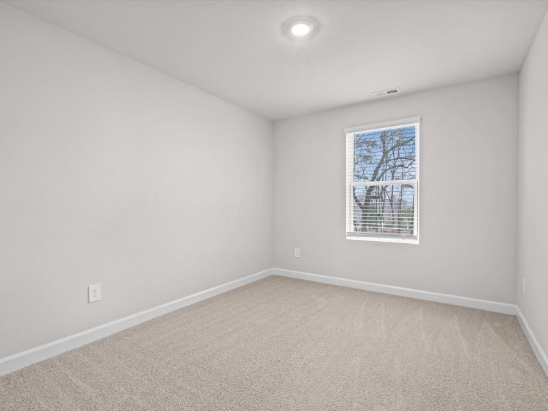 Spacious, unfurnished interior of a new home in Crossing at Abner Creek Townes, Greer (Image 14).