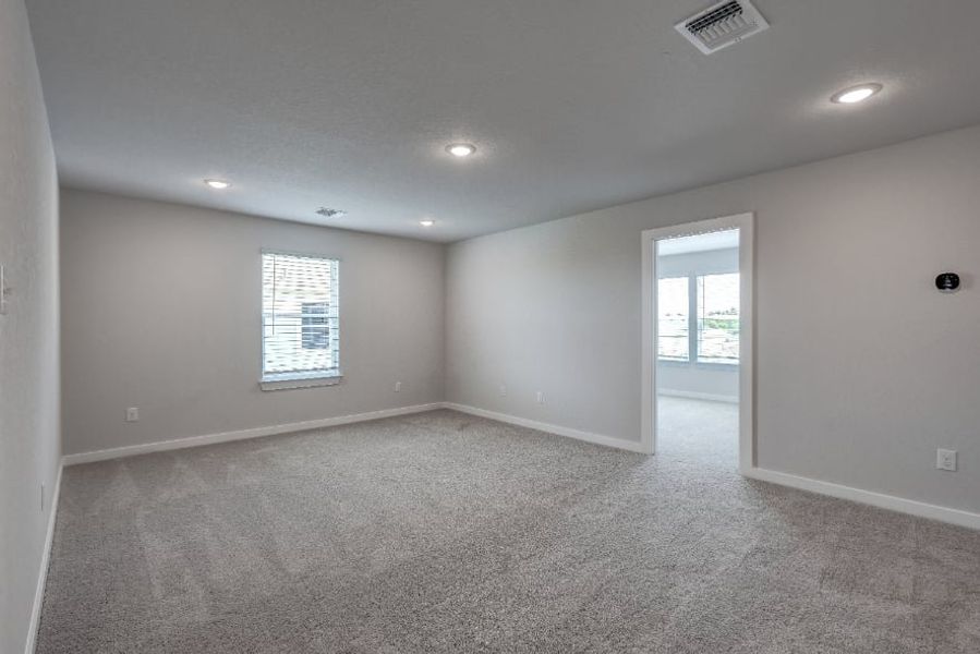 A room with a door and windows. A room with a door and windows.