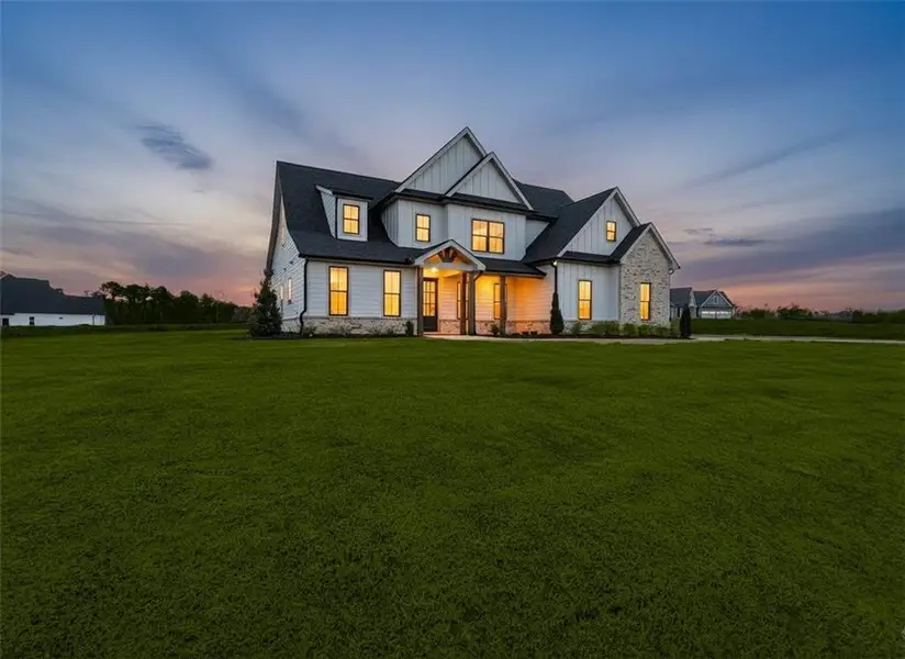 Front exterior of a new home in , Rydal, GA, highlighting curb appeal (Image 29). Front exterior of a new home in , Rydal, GA, highlighting curb appeal (Image 29).