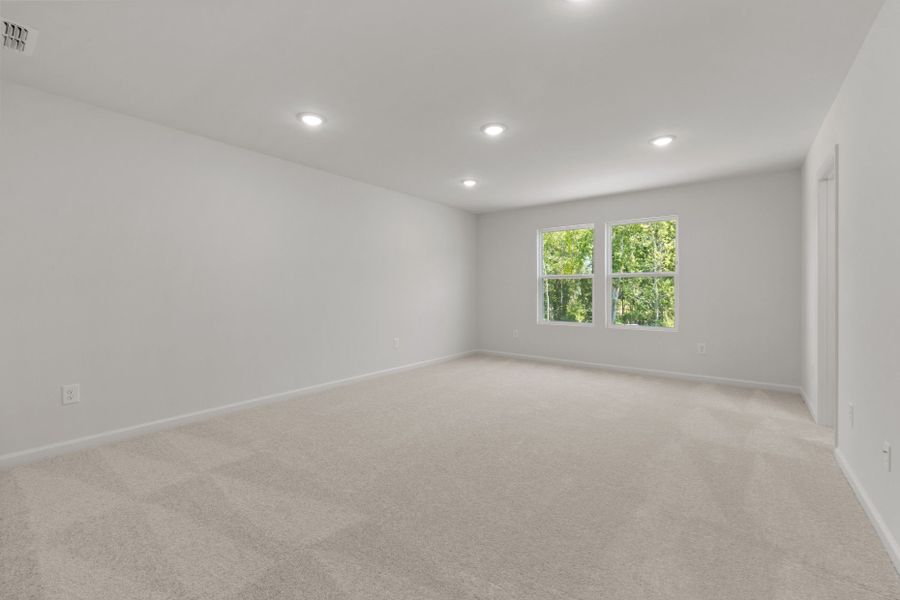 Spacious, unfurnished interior of a new home in Wimberly, Willow Spring (Image 23).