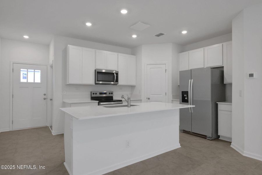 Furnished interior view inside a new home in Atlantis Pointe, Middleburg (Image 8).