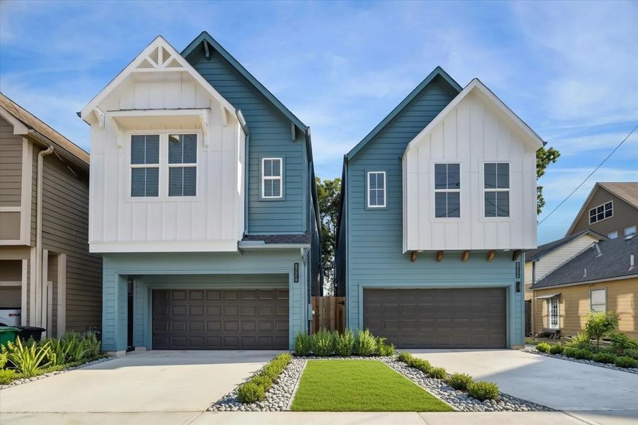 A captivating modern farmhouse façade with clean lines and welcoming charm. A captivating modern farmhouse façade with clean lines and welcoming charm.