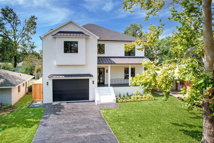 Welcome to 2102 Wakefield Drive, a stunning new construction from LR Luxury Homes in highly-sought after Oak Forest. A gorgeous slurried brick exterior is framed by mature trees and brand new landscaping. A spacious front porch invites early morning coffee on cool mornings.