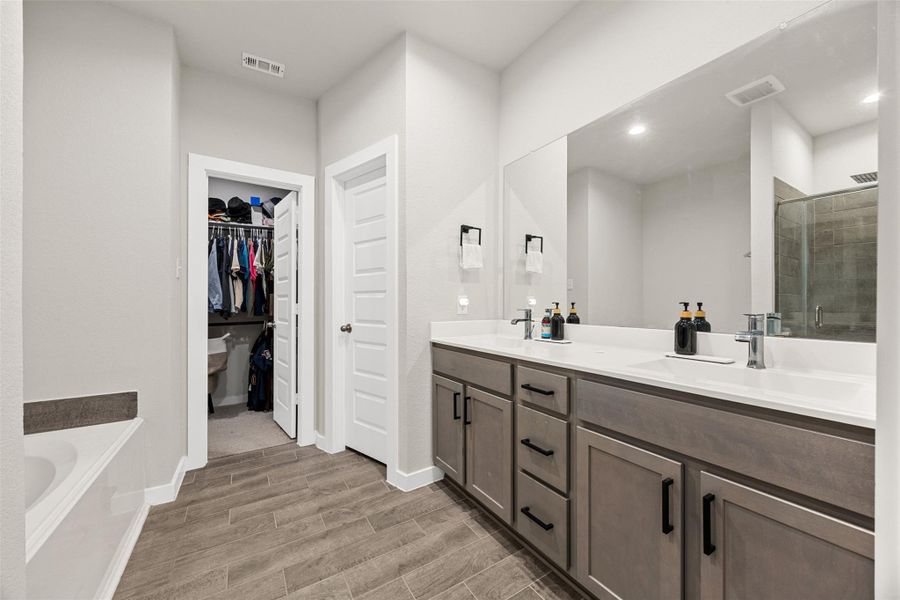 Furnished interior view inside a new home in Sunterra, Katy (Image 5).