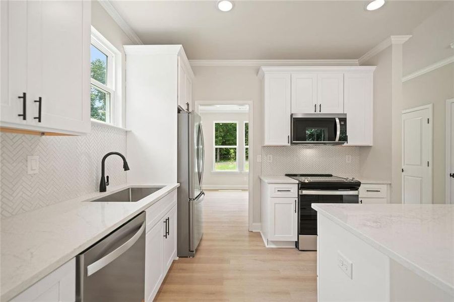 Furnished interior view inside a new home in , White (Image 5). Furnished interior view inside a new home in , White (Image 5).