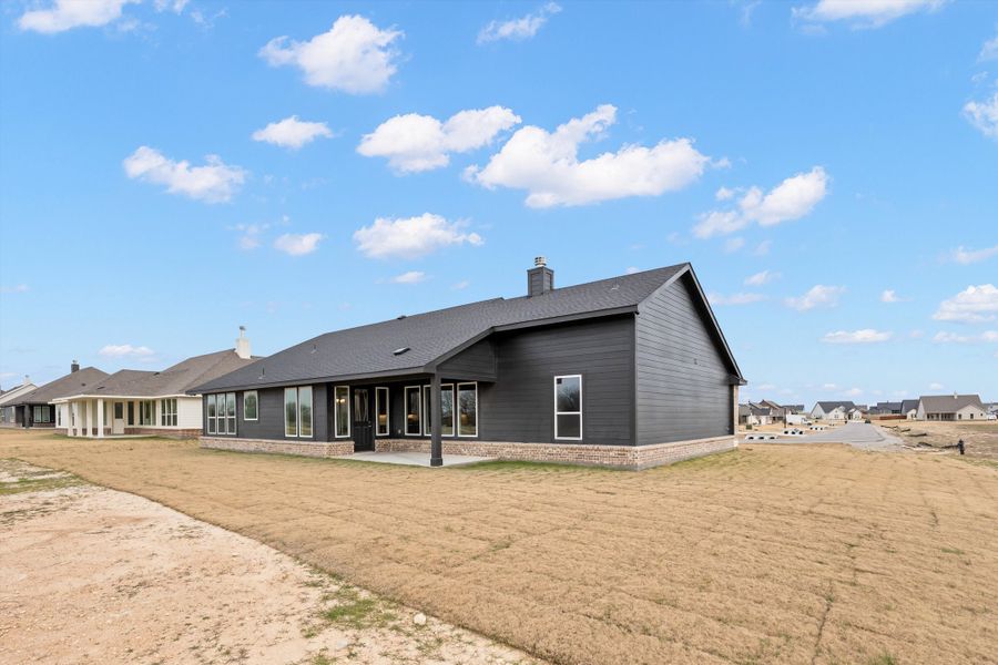 Exterior details and patio area of a home in Fairview Meadows, New Fairview (Image 31).