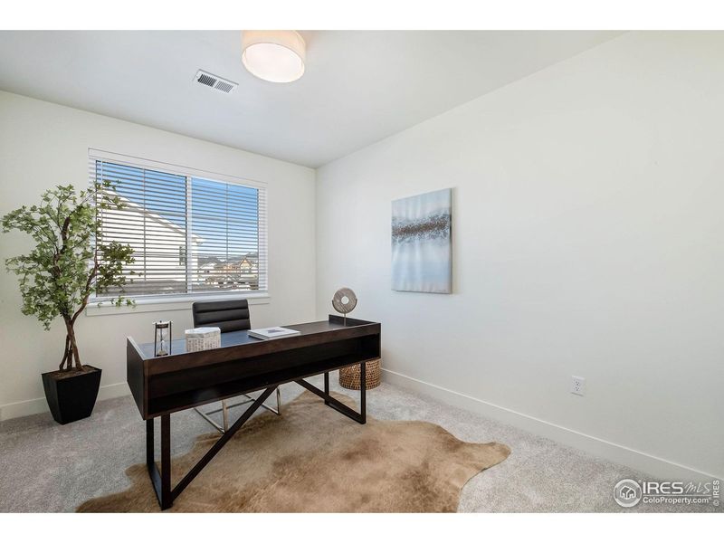 Furnished interior view inside a new home in Eagle Brook Meadows, Loveland (Image 12).