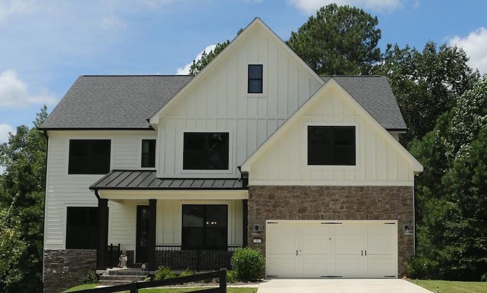 Front exterior of a new home in , Dallas, GA, highlighting curb appeal (Image 26). Front exterior of a new home in , Dallas, GA, highlighting curb appeal (Image 26).