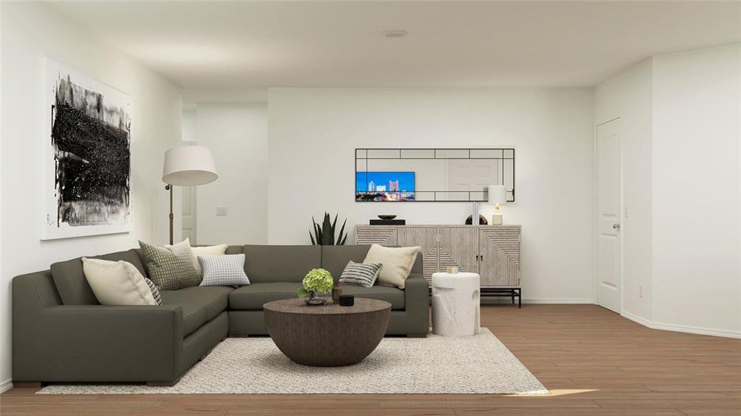 Living room with hardwood / wood-style flooring