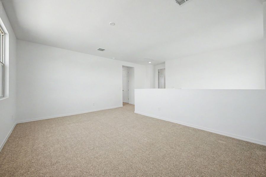 Spacious, unfurnished interior of a new home in White Tank Vistas, Waddell (Image 13).