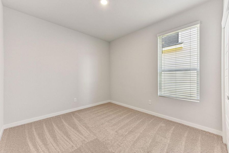 Spacious, unfurnished interior of a new home in Stallion Run, Buda (Image 27).