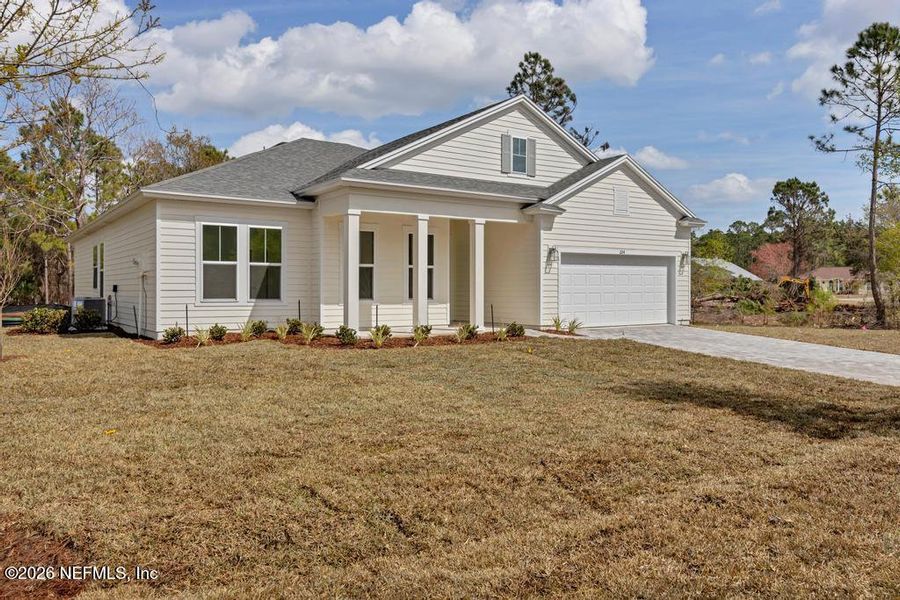 Front exterior of a new home in , St. Augustine, FL, highlighting curb appeal (Image 19).