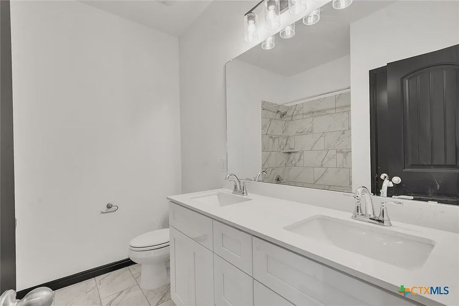 Furnished interior view inside a new home in Heritage Oaks, Killeen (Image 7).