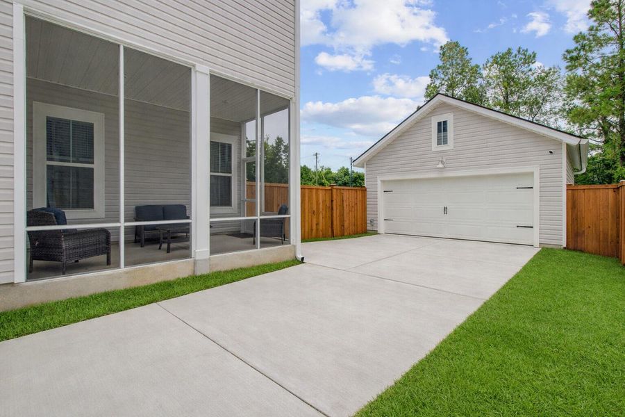 Exterior details and patio area of a home in Limehouse Village: Row Collection, Summerville (Image 3).