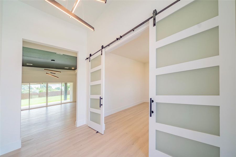 Versatile space upon entry, perfect as an office or a potential 5th bedroom with a closet. Versatile space upon entry, perfect as an office or a potential 5th bedroom with a closet.