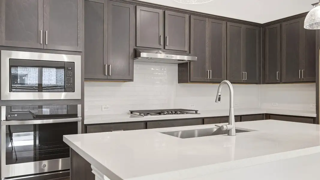 Furnished interior view inside a new home in Sunfield, Buda (Image 28).