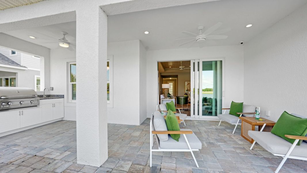 Exterior details and patio area of a home in Wildleaf, Parrish (Image 4).