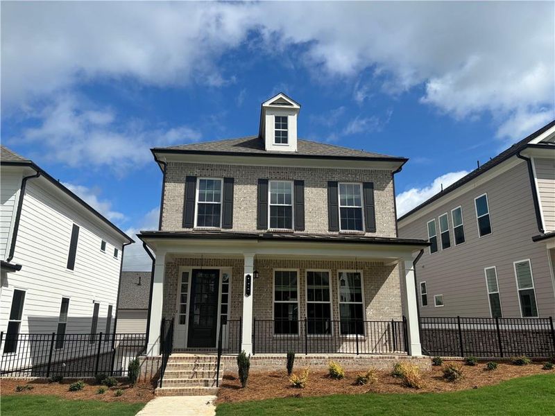 Front exterior of a new home in Brackley Single Family, Cumming, GA, highlighting curb appeal (Image 2).