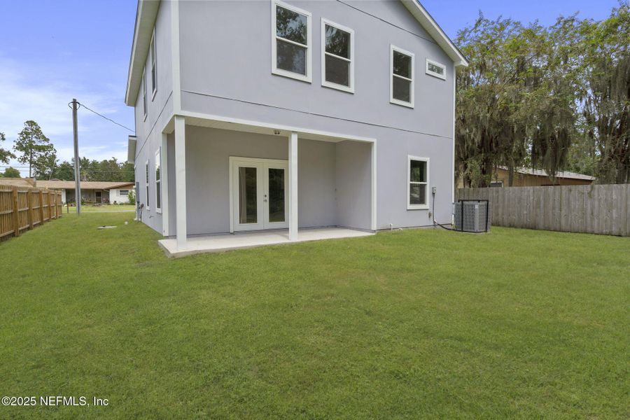 Front exterior of a new home in , Fleming Island, FL, highlighting curb appeal (Image 18).