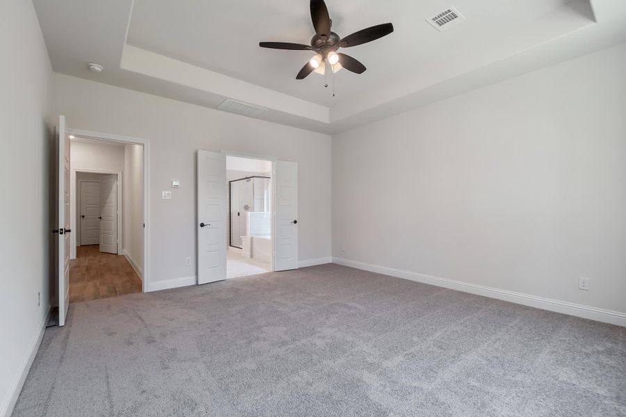 Primary Bedroom | Concept 2972 at Villages of Walnut Grove in Midlothian, TX by Landsea Homes