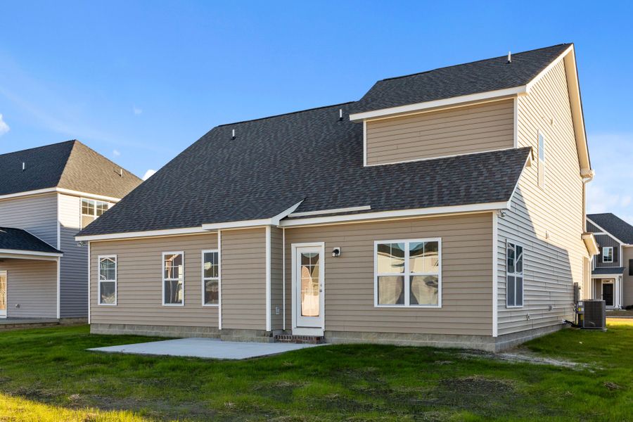 Exterior details and patio area of a home in Arbor Hills South II, Greenville (Image 27).