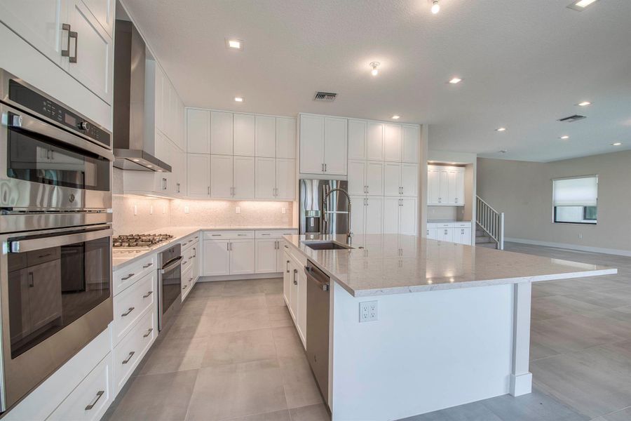 Furnished interior view inside a new home in Apex at Avenir, Palm Beach Gardens (Image 20). Furnished interior view inside a new home in Apex at Avenir, Palm Beach Gardens (Image 20).