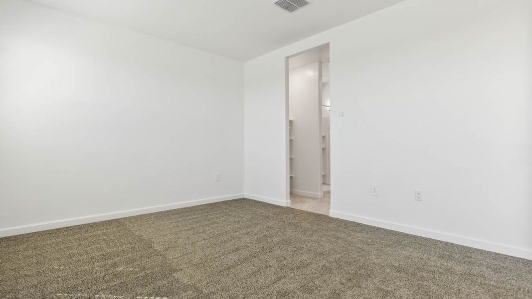Spacious, unfurnished interior of a new home in Heartland Ranch, Coolidge (Image 15).