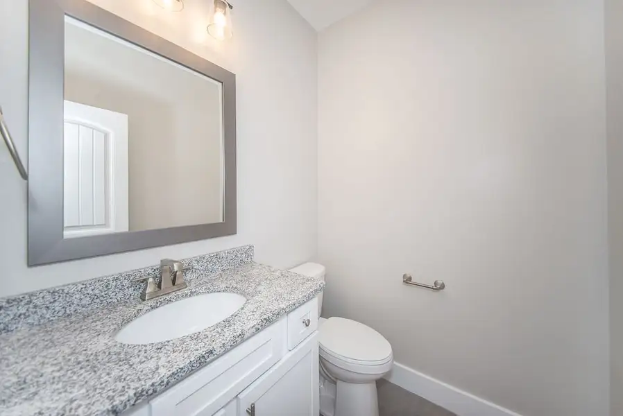 Representative furnished interior of a home built from the Beaumont Elite by Enchanted Homes in Pointe Summit, Slater-Marietta (Image 14).