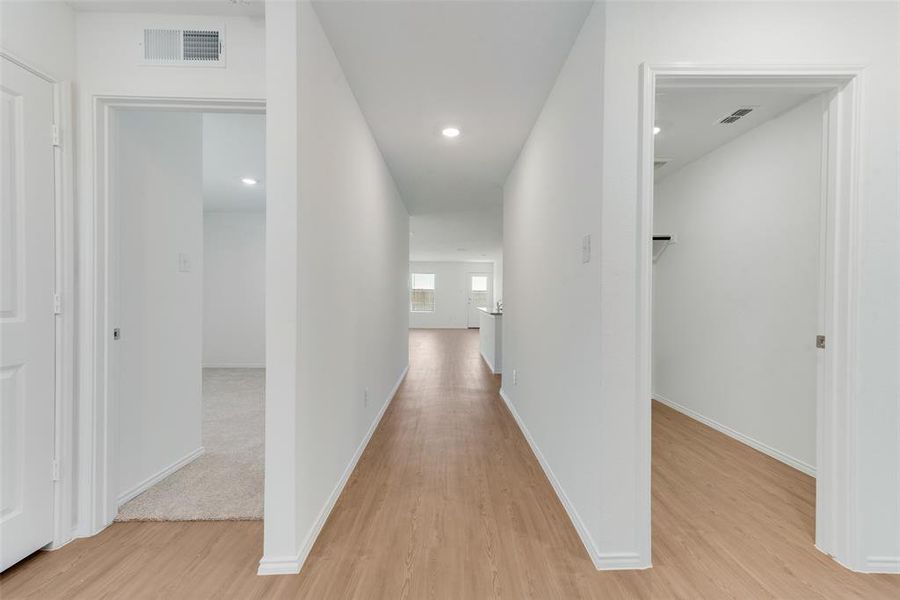 Hall featuring light hardwood / wood-style floors