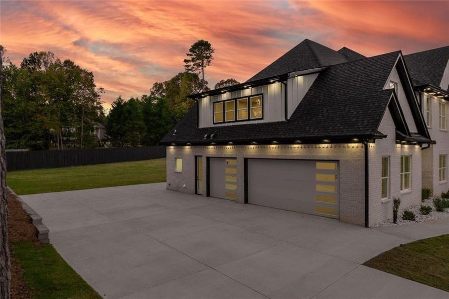 Front exterior of a new home in , Loganville, GA, highlighting curb appeal (Image 33).