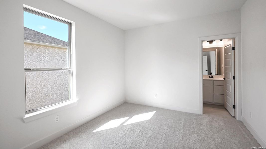 Spacious, unfurnished interior of a new home in Hidden Canyon, San Antonio (Image 18).