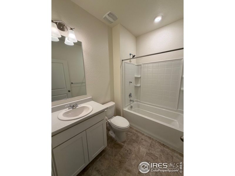 Guest bath with tub on main level. Guest bath with tub on main level.