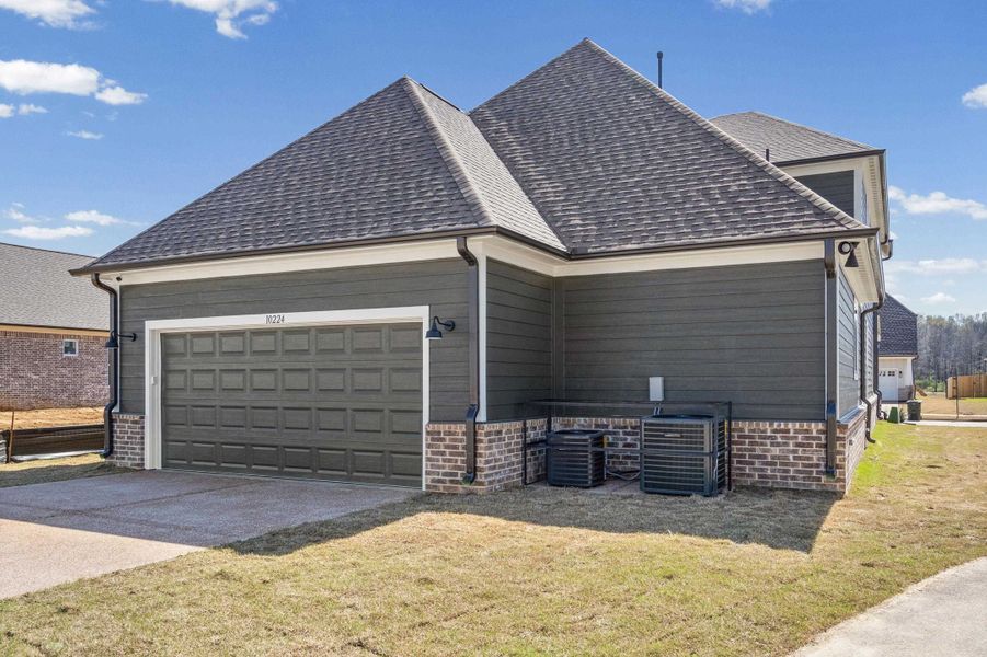 Front exterior of a new home in Lockwood, Collierville, TN, highlighting curb appeal (Image 18).