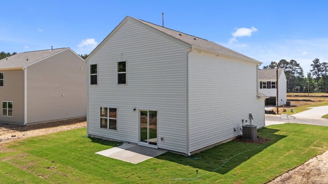 Exterior details and patio area of a home in Hobbs Farm, Ayden (Image 21).