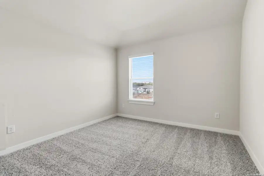 Spacious, unfurnished interior of a new home in Hunters Ranch, San Antonio (Image 21).