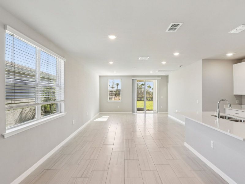 Spacious, unfurnished interior of a new home in Crescent Lakes - Premier Series, Punta Gorda (Image 13).
