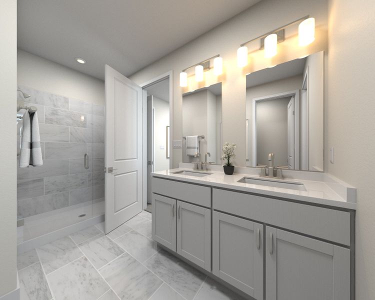 The primary bathroom offers dual vanity sinks and a walk-in closet.